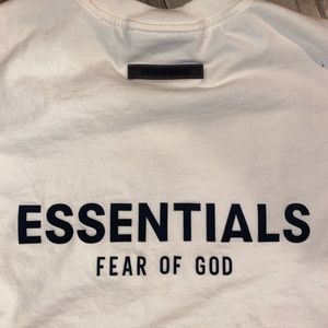 Essential t shirt could be men or women fits a small or medium as well